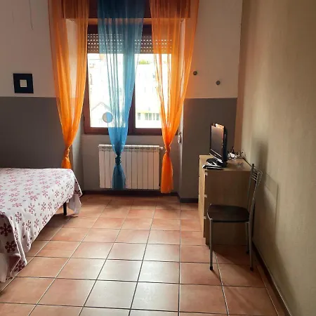Апартаменты Grazioso Trilocale Centro/stazione