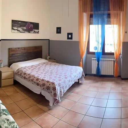 Апартаменты Grazioso Trilocale Centro/stazione *